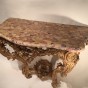 Console dapplique en bois de tilleul doré, Provence époque Louis XV Consoles