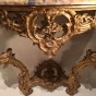 Console dapplique en bois de tilleul doré, Provence époque Louis XV Consoles